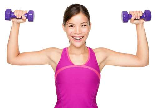 Woman holding two dumbbells.