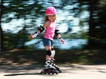 	photo: girl skater wearing protective gear
