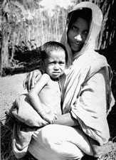 Three-year-old Rahima Banu, who is the last known person to have had naturally acquired smallpox, or variola major, in the world, with her mother in Bangladesh. Her case was reported to the local Smallpox Eradication Program team by an 8-year-old girl named Bilkisunnessa, who was paid 250 Taka reward for her diligence. Source: CDC/ World Health Organization; Stanley O. Foster M.D., M.P.H.
