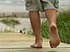 walking barefoot at the beach