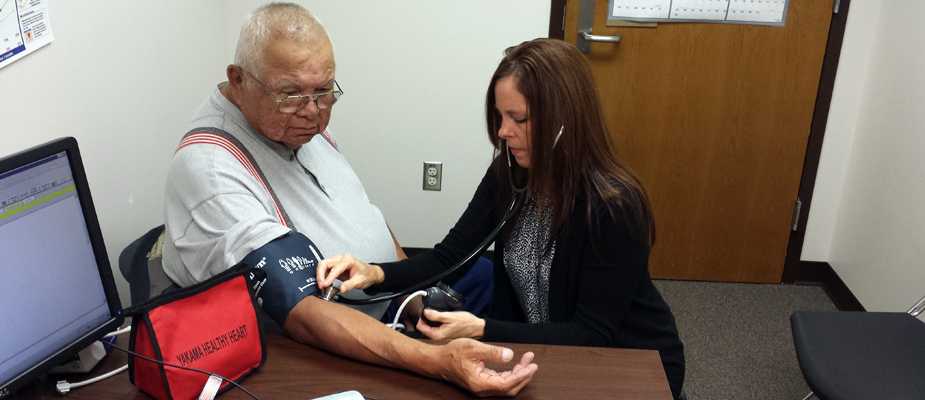 Man getting Blood Pressure checked