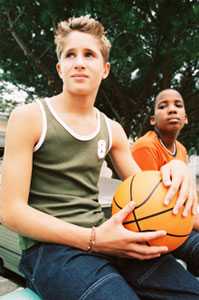 Teen boys with a basketball