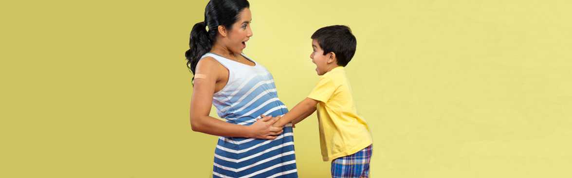 Pregnant woman with her son.
