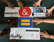 Diverse hands around piece of paper with the phrase equality and respect equal healthy relationships. 