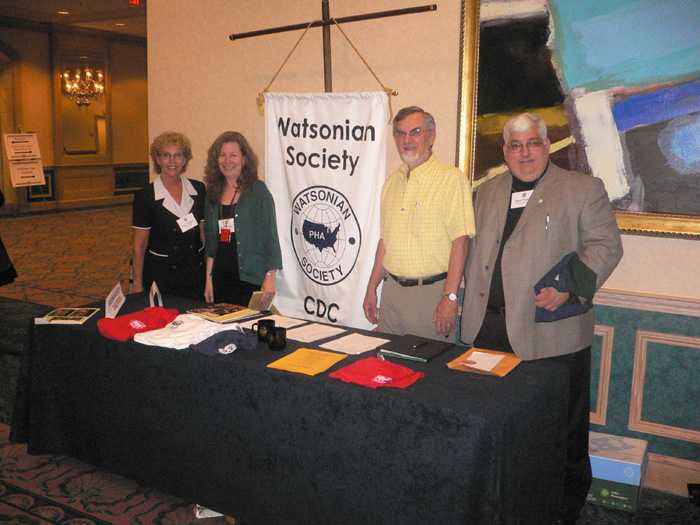 Fred Martich (second from right) propagandizes Mary Tollefsen (FL DOH), Judy Lipshutz (DSTDP), and Juan Mendez (Portland, OR)