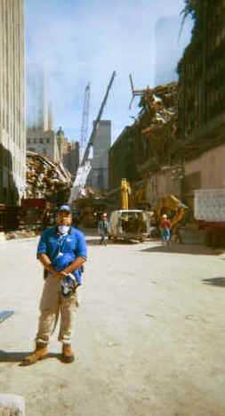 PHA in front of rubble from the World Trade Center