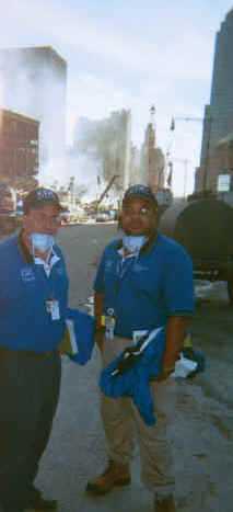 2 PHAs in front of rubble from the World Trade Center