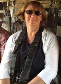 Gayle Debord aboard a helicopter in Liberia